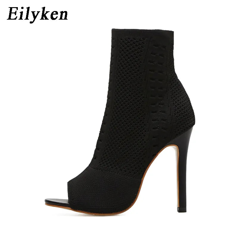 Experience ultimate style and comfort with our New Peep Toe Ankle Boots