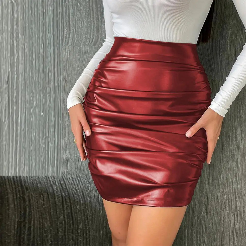 Experience the ultimate in style and confidence with our Mini Skirt made from high quality faux leather!