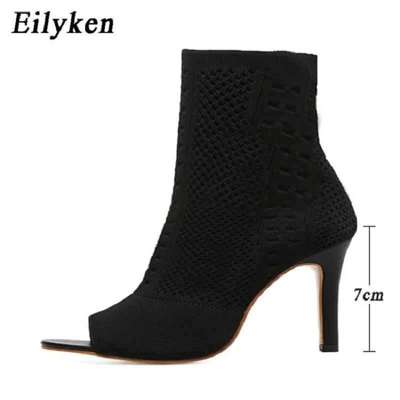 Experience ultimate style and comfort with our New Peep Toe Ankle Boots