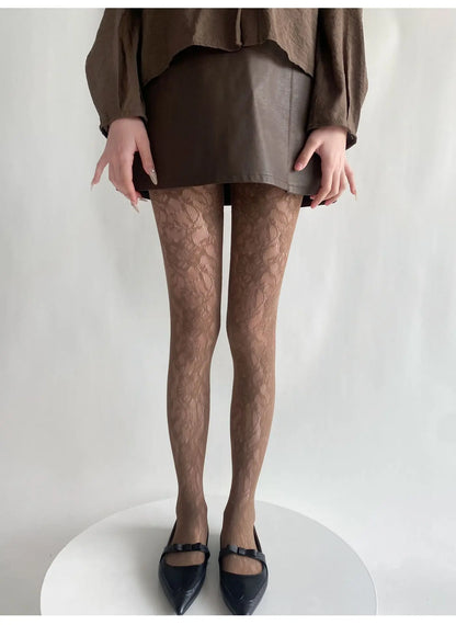 Conquer the day with these Mesh Tights featuring a stunning Lace Floral Pattern