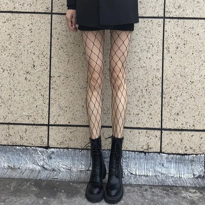 Get ready to turn heads with our Fishnet Tights - from Micro to Whale