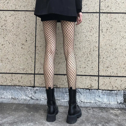 Get ready to turn heads with our Fishnet Tights - from Micro to Whale